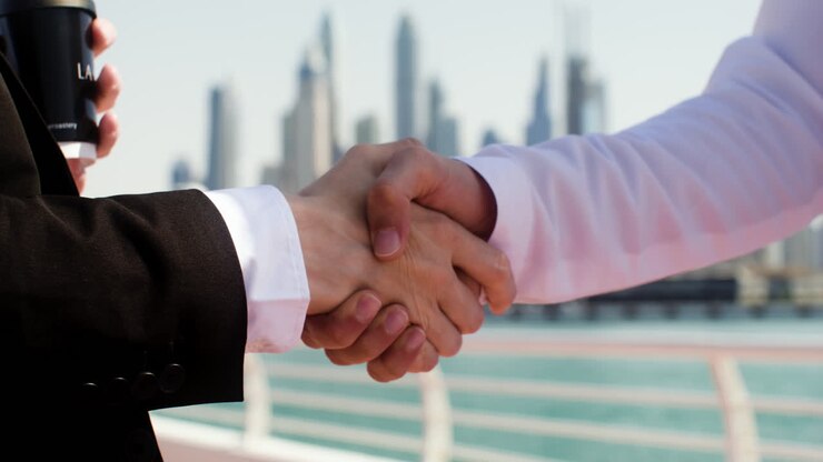 Two people talking about business