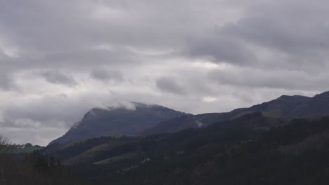landscape timelapse of spanish nature, hills and cloudy day with fog or mist