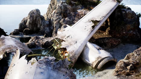 airplane wreckage on rocky coast