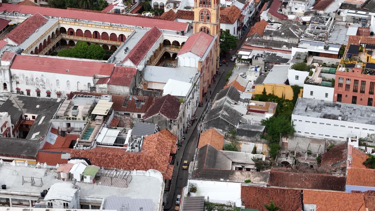 Cartagena, Colombia. Drone Shot of Street Traffic in Old Town, Flying Above Old Colonial Buildings