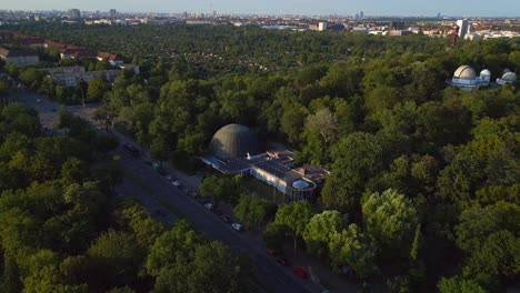 Smooth-aerial-top-view-flight-Berlin-city-Planetarium-Germany-in-Europe,-summer-day-2023