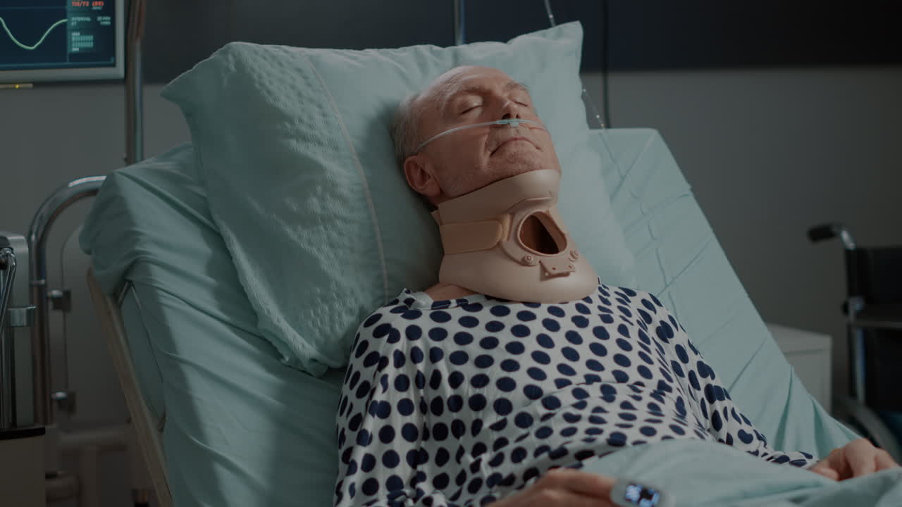 Portrait of elder patient sitting with cervical neck collar