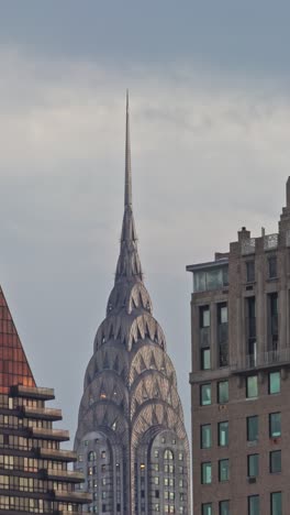 the manhattan skyline rises over the east river