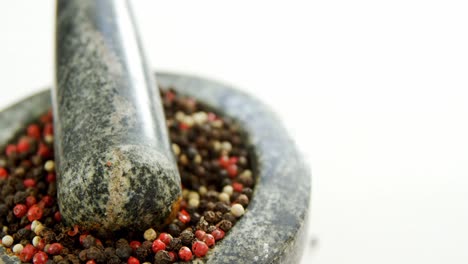 black pepper in mortar and pestle 4k