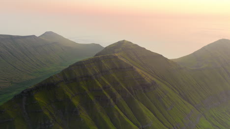 Panoramic Aerial View of Green Mountain Peaks at Sunset