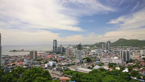 Scenic-View-from-a-Thai-Temple-Viewpoint-Overlooking-the-City-of-Chonburi,-Thailand-on-Sunny-Day