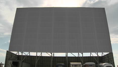 a shot of clouds passing over an abandoned drive in theater screen 2