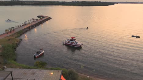 Aerial-Tracking-Of-Boats-At-Sunset