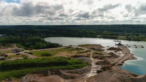 aerial-view-of-sand-mining-on-the-river-bank-in-rural-europe