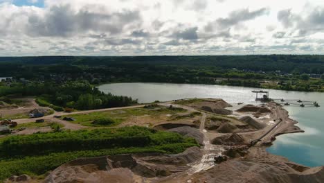aerial view of sand mining on the river bank in rural europe