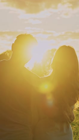 couple embracing at sunset