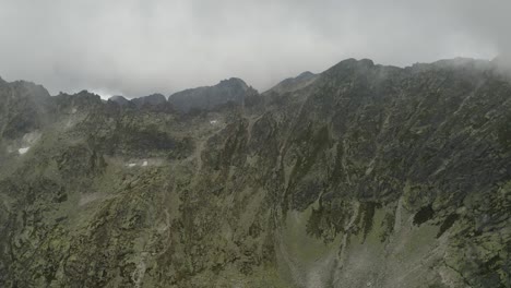 beautiful footage of mountain range near skok waterfall and hruby vrch high tatras in slovakia - wide shot