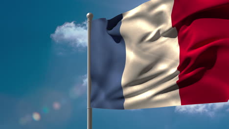 drapeau national français agitant sur le mât du drapeau