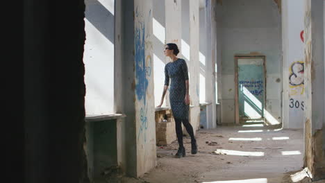 lonely sad woman in an abandoned house walking from side to side