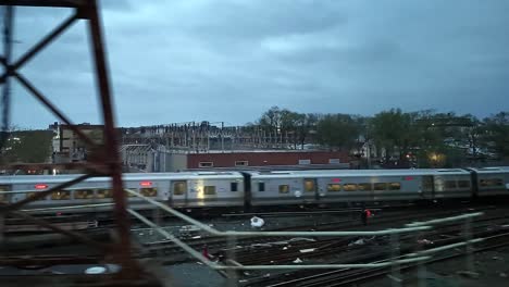 A-shot-of-a-Long-Island-railroad-train-traveling-on-a-cloudy-day