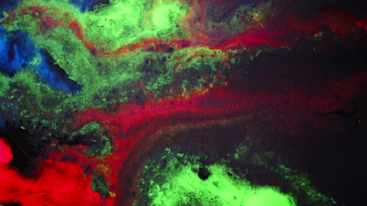 Colorful macro of liquid substances mixing, abstract and psychedelic look
