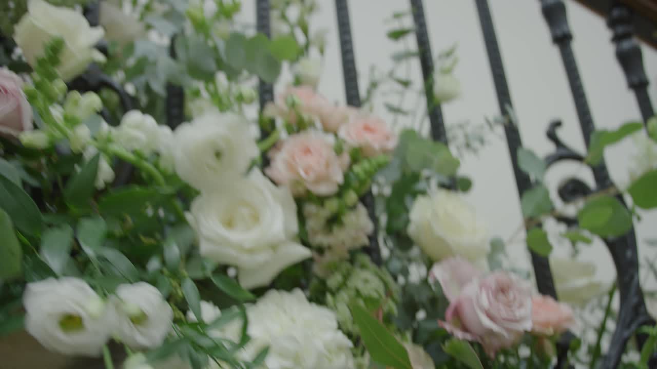 Orbital shot of roses on a wedding day at a manor house in Tockington, UK.