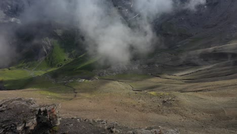 Drone-shot-of-a-steep-slope-with-bare-land