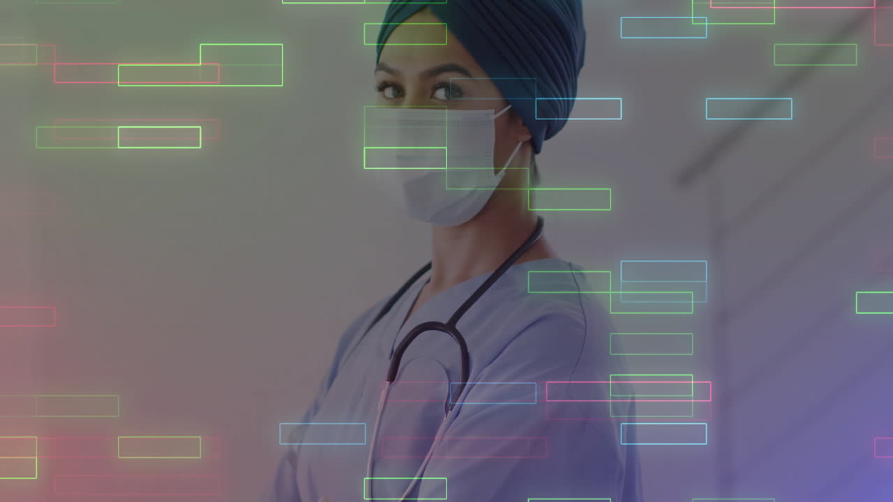 Female healthcare worker standing in clinical hallway, showing neon digital health data overlays