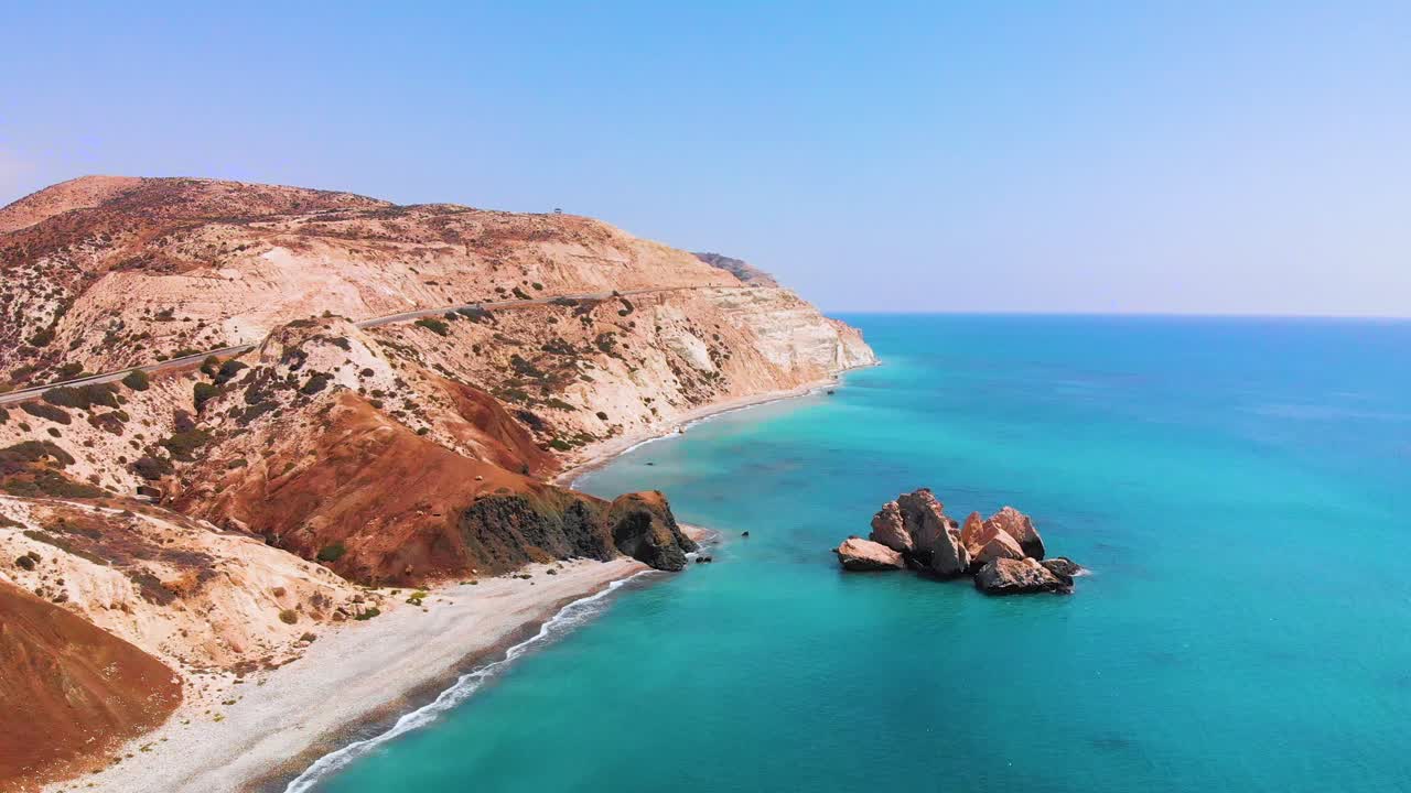 Static aerial shot looking down on Aphrodite's Rock in Paphos Cyprus
