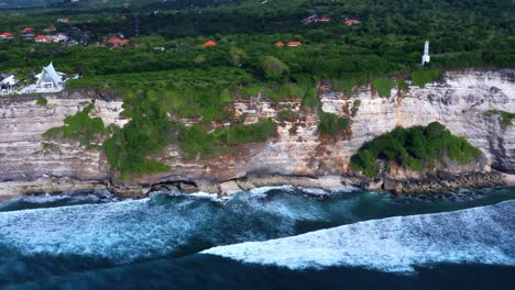 uluwatu cliffs beautiful landscape in bali, indonesia - aerial drone shot