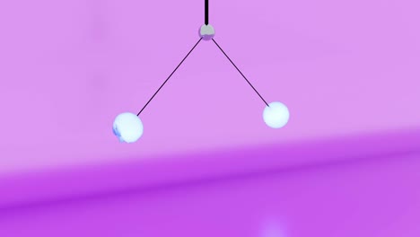 un péndulo simple balanceándose contra un fondo púrpura