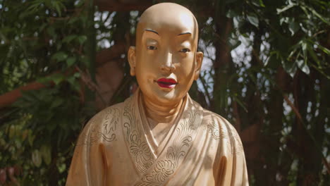 beautiful golden buddha statue close up