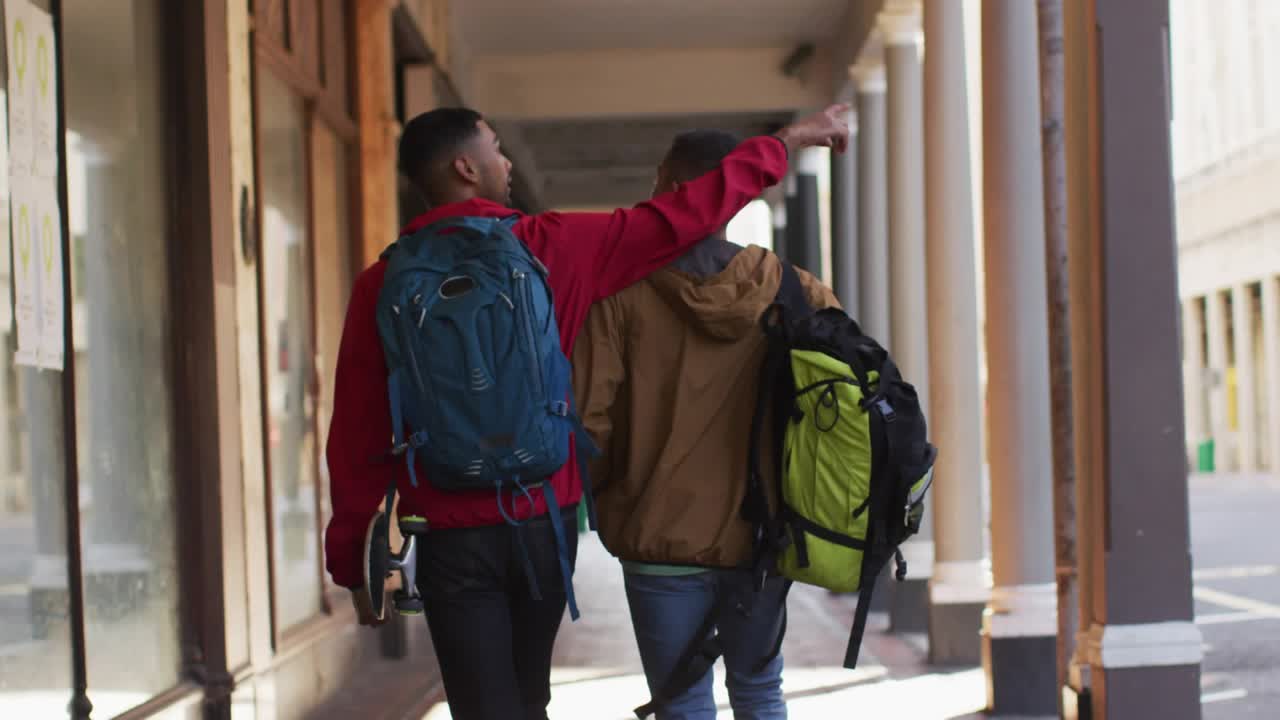 Marketing scene with two friends walking, pointing then draping arm while emoji rising, bonding