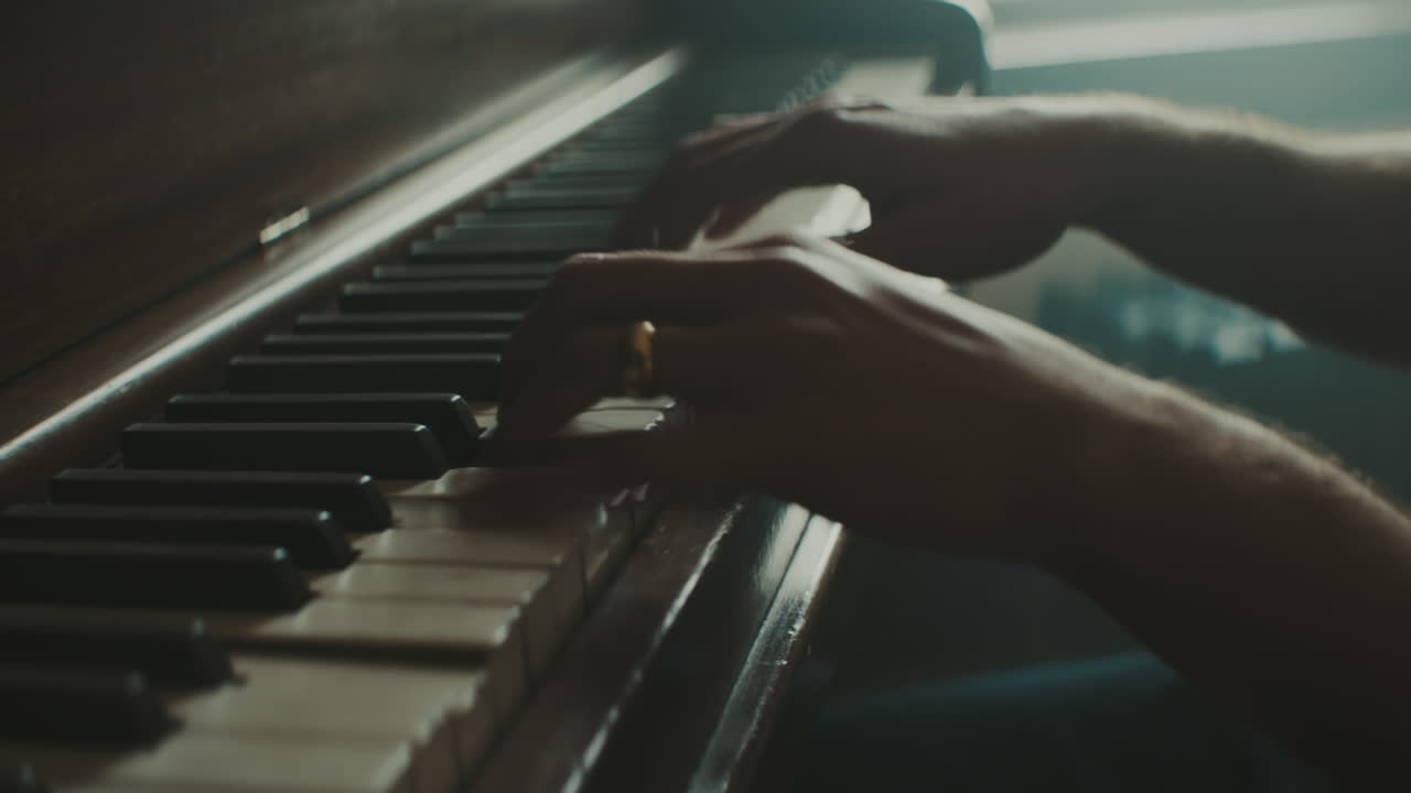 Pianist plays the piano in slow motion
