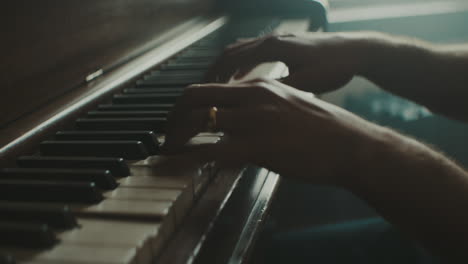 pianist plays the piano in slow motion