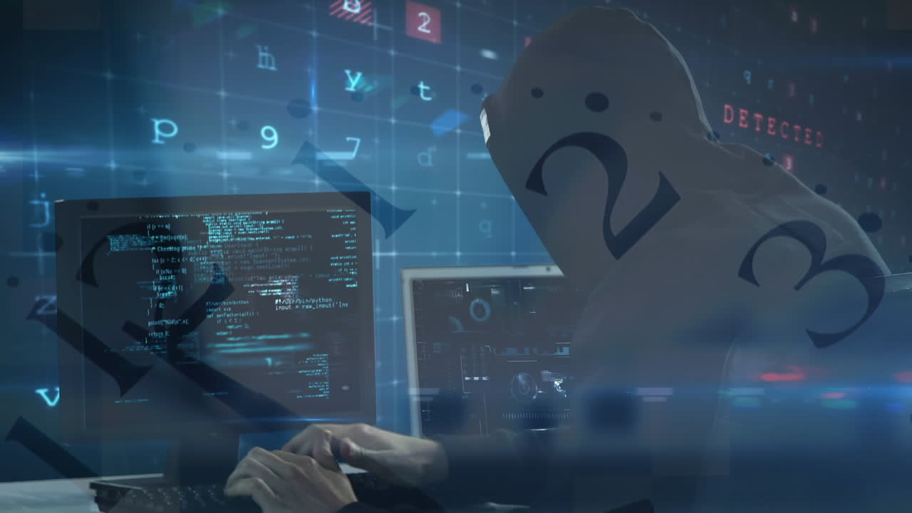 어두운 방에서 컴퓨터를 사용하는 해커