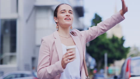 City,-travel-and-a-woman-hailing-a-taxi