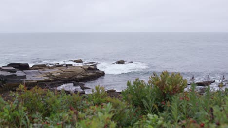 Men-Fishing-Off-Rocks-During-Storm-2