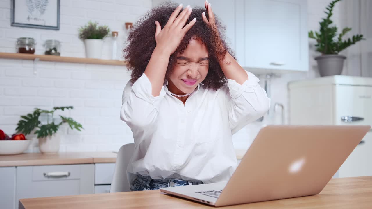 Anger young african american woman makes disappointment gesture feels unhappy
