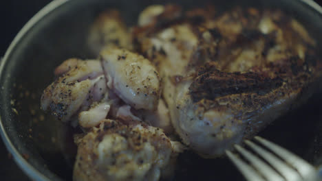 seared chicken pieces in a pan