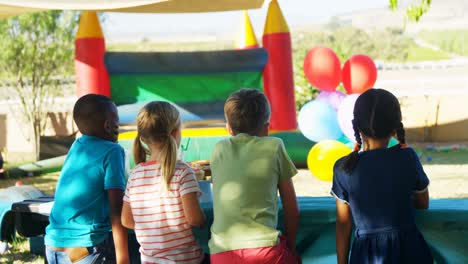 Kids-standing-in-the-playground-4k