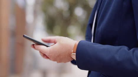 Woman,-phone-and-hands-in-the-city-with-web