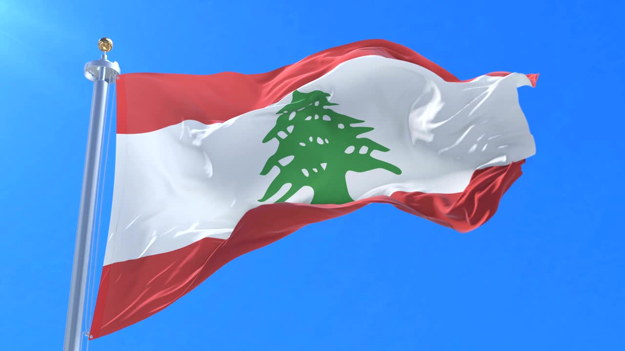 Lebanon flag waving at wind with blue sky in slow, loop