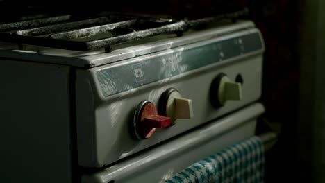 old stove in a dark kitchen, close up