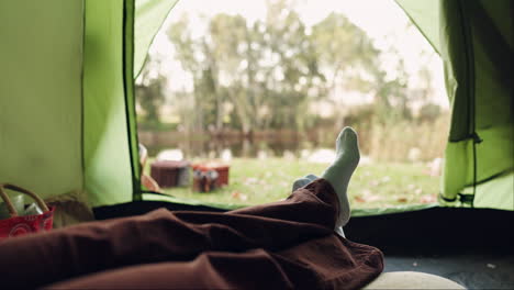 Tent,-camping--and-view-with-feet