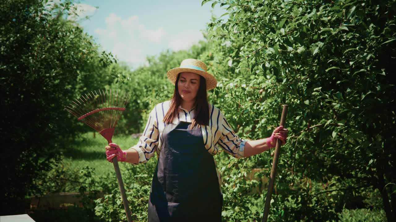 Woman Gardening in a Sunny Orchard