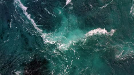 Waves-of-water-of-the-river-and-the-sea-meet-each-other-during-high-tide-and-low-tide.