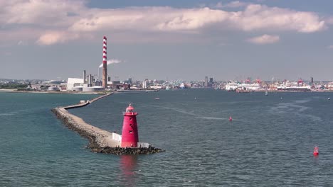 Poolbeg Lighthouse on South Wall and Dublin Port, industrial landscape. Aerial drone