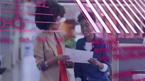 animation of financial data processing over diverse colleagues discussing work in office