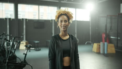 portrait of a woman in a gym