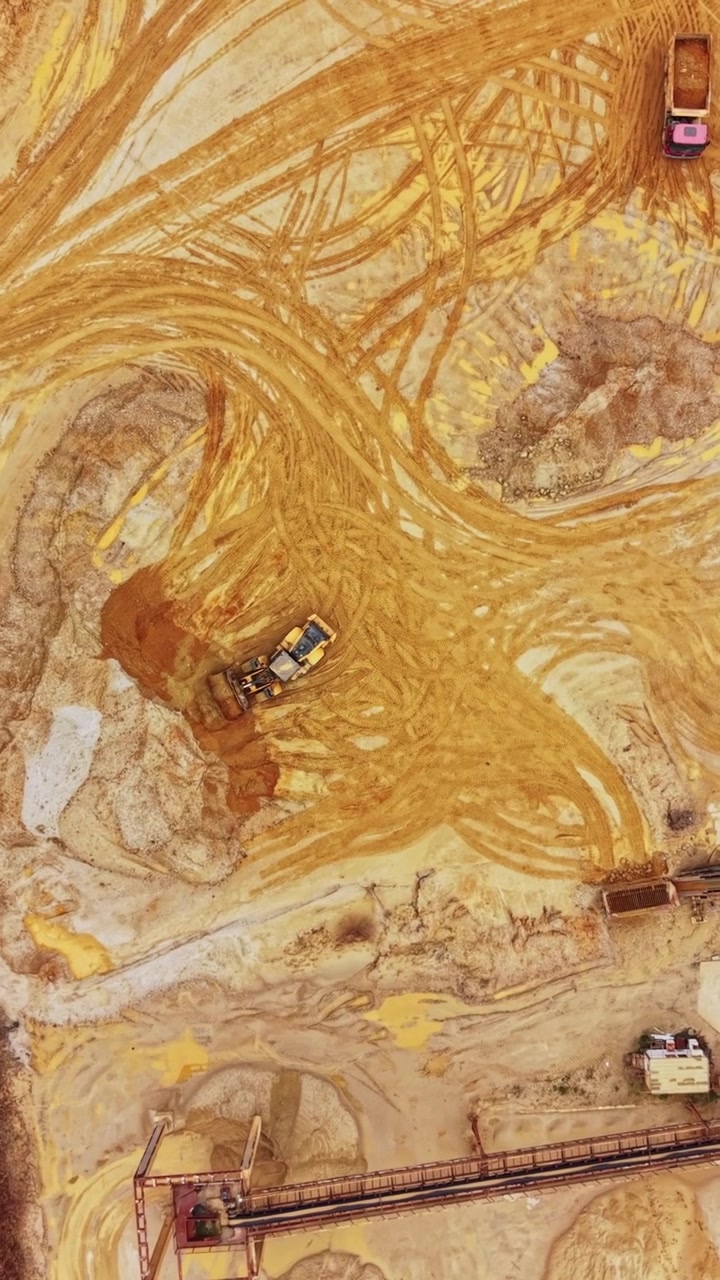 Aerial View of Bulldozer Working in Sand Quarry