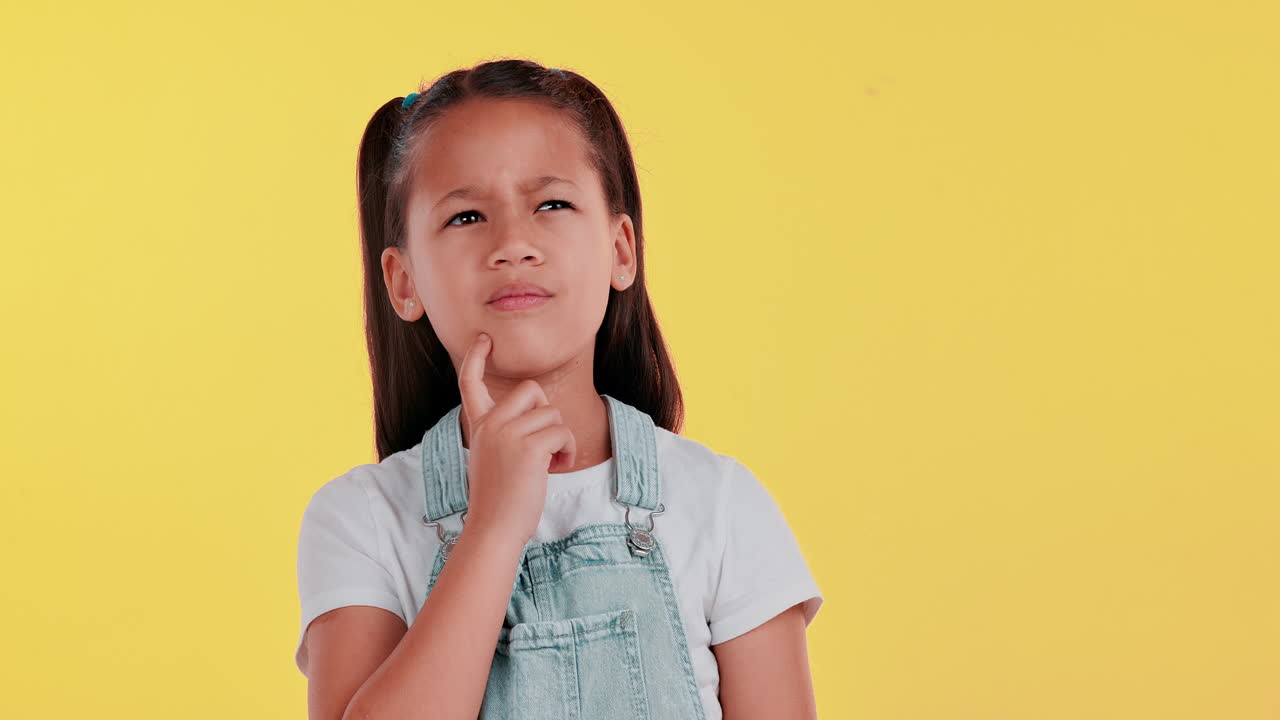 A thoughtful young girl pondering a question
