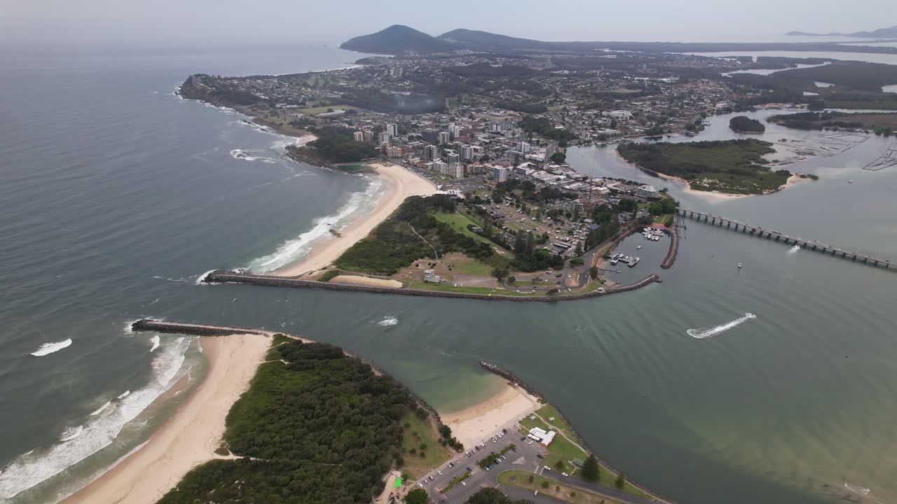Aerial View Of Coolongolook River Between Towns Of Forster And Tuncurry In New South Wales, Australia. orbiting shot