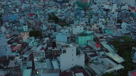 Early-morning-drone-fly-in-over-modern-urban-rooftops