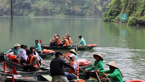 tourists enjoying a guided boat tour on river